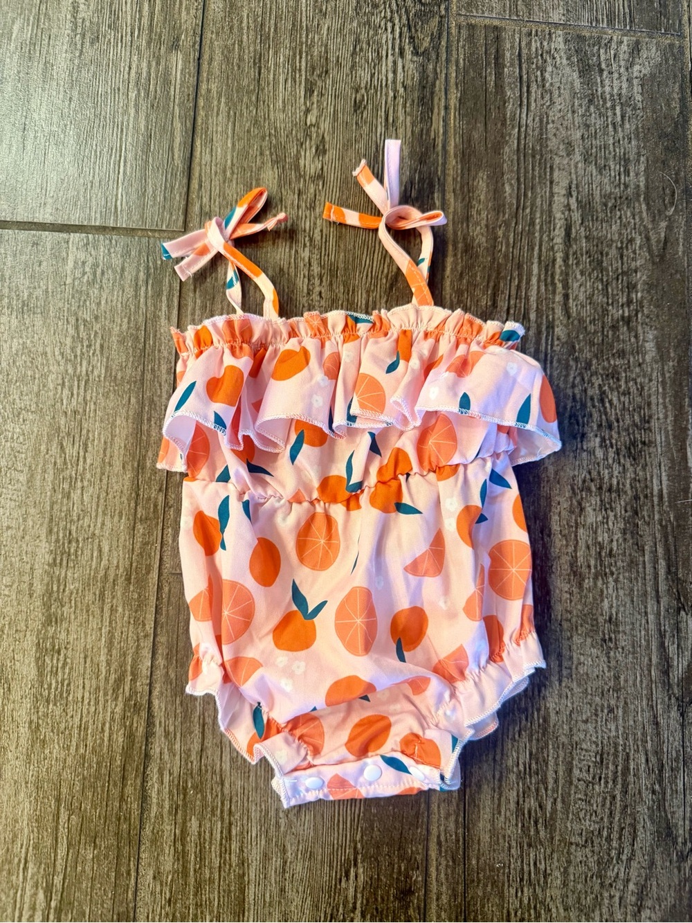 0-3 month orange baby onsie